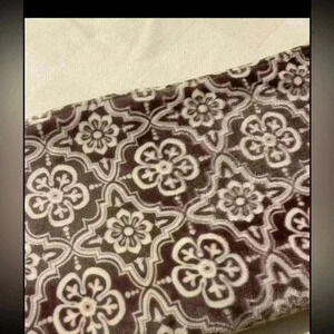 Lot of two purple very lightly used throws